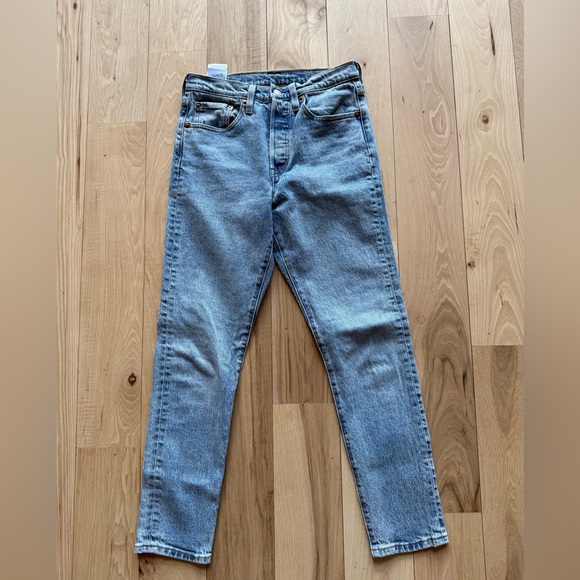 Levi's Denim - Levi’s 501 light wash jeans denim. Sold at Free People Urban